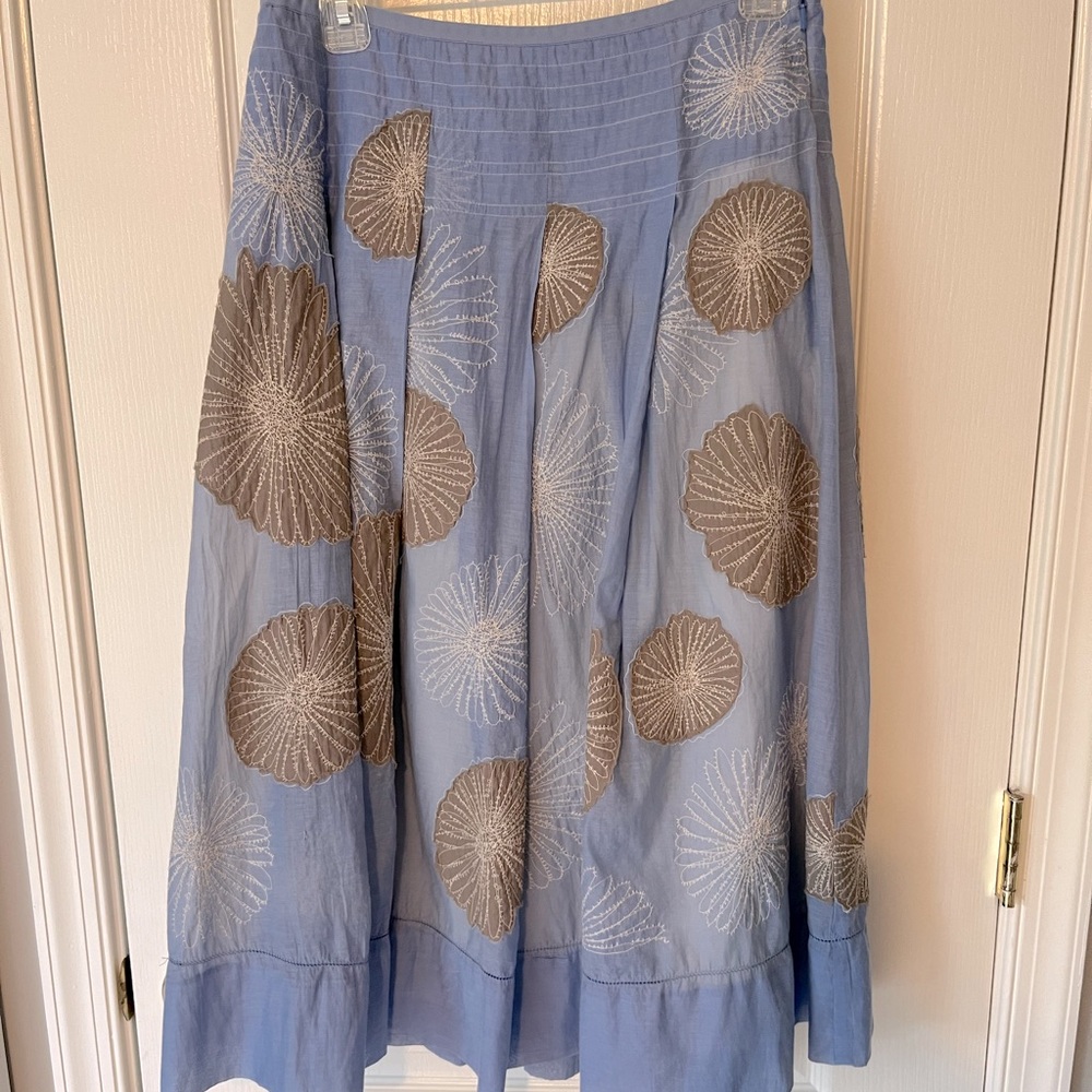 Gorgeous designer skirt with delicate embroidery. Knee length